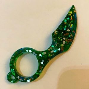 A forest green spike with multiple decorations and a spot for the kitchen⚠️⚠️